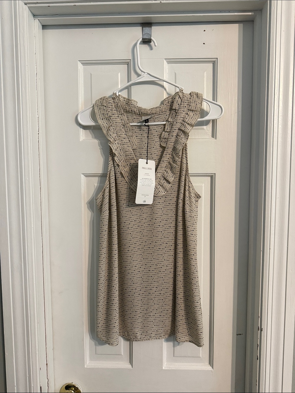 CAbi Cream Ruffled Sleeveless Knit Top with Black Dot Print